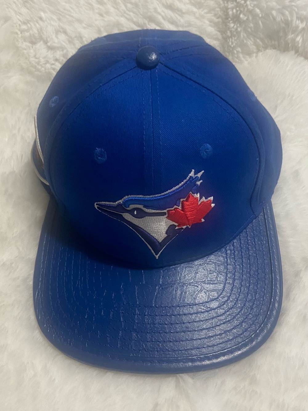 Royal Blue Baseball Cap with Red Maple Leaf Logo